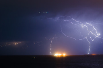 Naklejka na ściany i meble UFO and powerful storm on the sea. Cyprus
