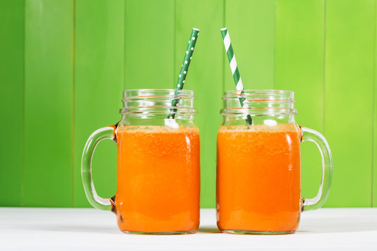 Carrot juice in masons jars