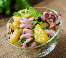 Potato salad with pickled octopus and green onions