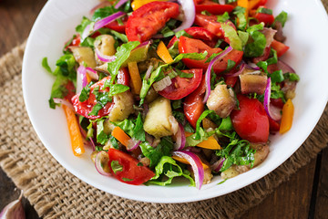 Salad baked eggplant and fresh tomatoes