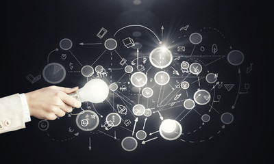 Glowing electric bulb . Concept image