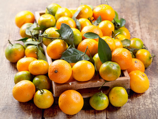 fresh mandarin oranges fruit  in wooden box
