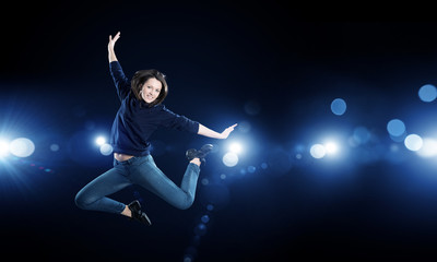 Fototapeta na wymiar Dancer girl in jump