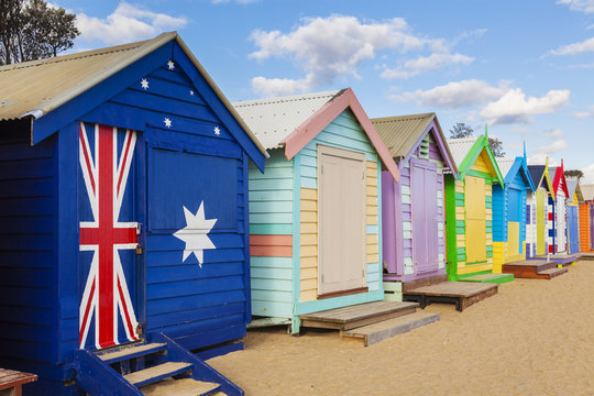 Bathing boxes in a beach with copyspace