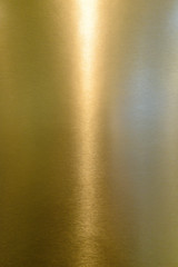 Yellow shiny metal surface