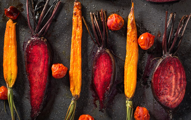 Baked carrots and beets with tomatoes
