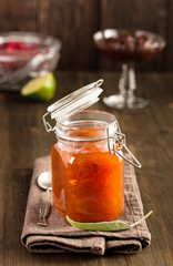 Glass jar of apricot jam