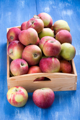 Apples in wooden box