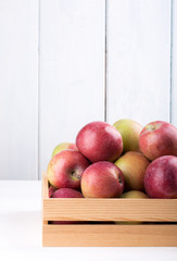 Apples in wooden box
