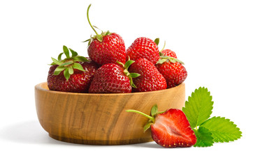 Red sweet strawberries in plate on white background