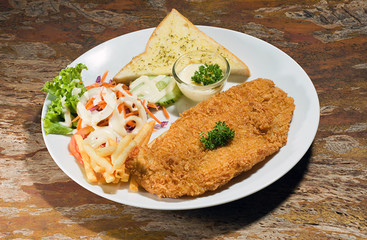 fish steak with salad