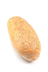 Fresh bread with sesame seeds isolated on white
