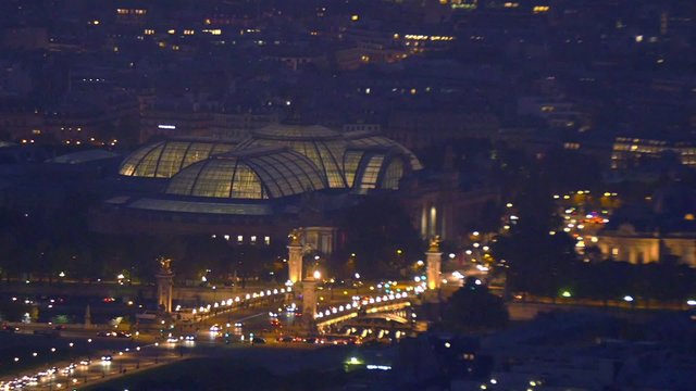 Paris, the Grand Palais and Alexander iii bridge at night, aerial view with zoom and pan