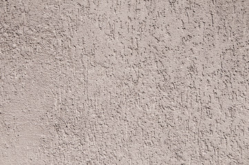 Plastered and painted facade surface of house wall as background