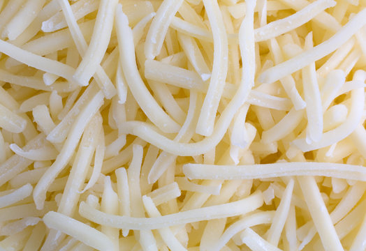Close view of natural white mild cheddar cheese
