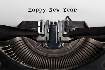 Happy new year word written by old typewriter