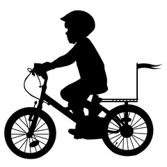 Fototapeta premium A boy rides a bicycle with flag