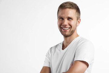 Fototapeta premium Close-up portrait of a smiling a beautiful man