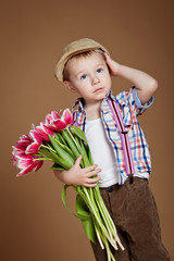 Retro boy with tulips bouquet