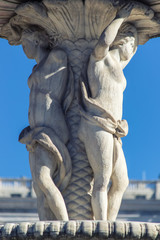 classical fountain's detail in royal palace garden in madrid