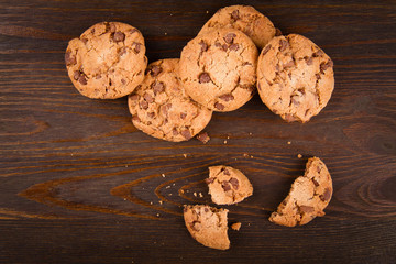 cookies with chocolate on a dark table