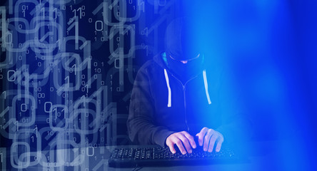 Network illegal access, computer hacker typing on keyboard