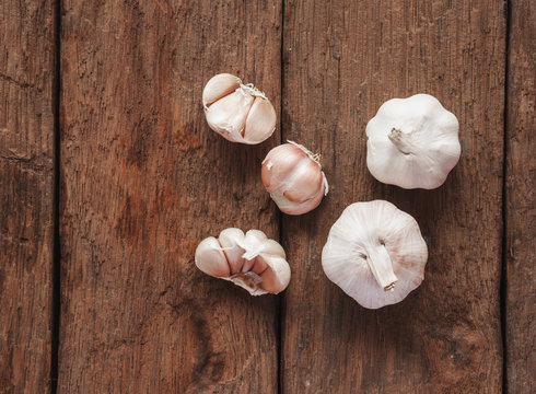 Organic garlic on a wooden background, Still life tone