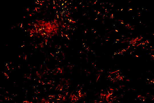 red  hot sparks on a black background 