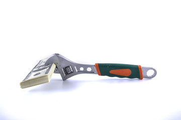 adjustable spanner and money