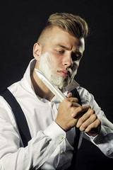 Young shaving boy