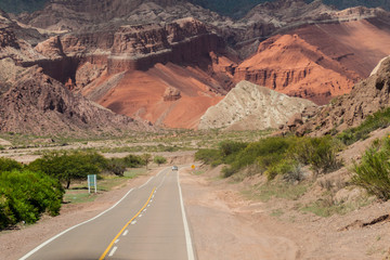 Road through Quebrada de Cafayate valley, which is full of colorful rock formations, northern Argentina.