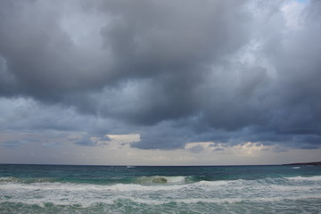 dark gray storm clouds over the sea