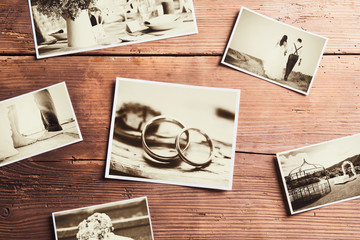 Fototapeta na wymiar Wedding photos on a table