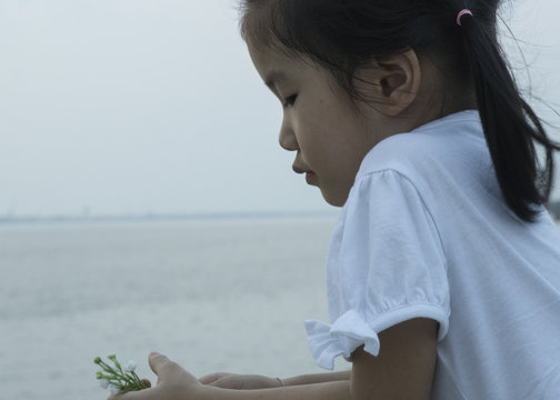 Child thinking beach sea person Asian Thai concept