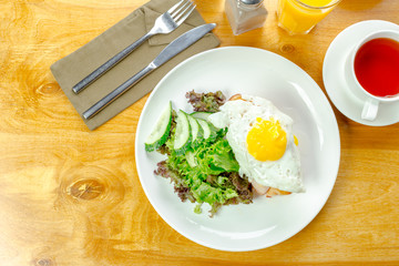 Fried egg and salad