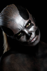 Woman in day of the dead mask skull face art. Halloween face art