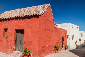 Houses with flowers in Santa Catalina monastery in Arequipa, Peru