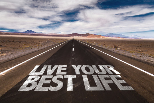 Live Your Best Life written on desert road