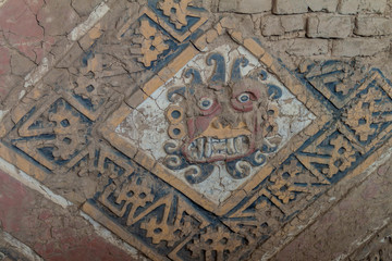Decorated wall at archeological site Huaca del Sol y de la Luna (Temple of the Sun and the Moon) in Trujillo, Peru. Site was built in Moche period.