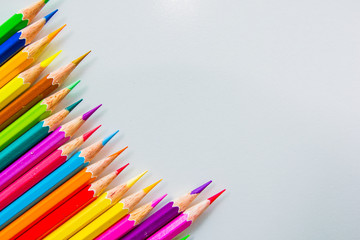 Colour pencils isolated on white background close up