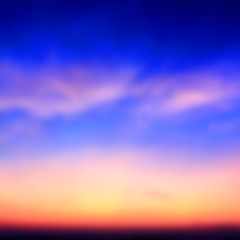 Blurred image of colorful sunset on the beach background.