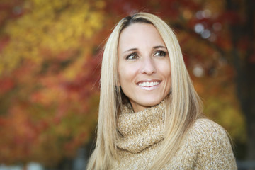 Portrait Of A Mature Woman Smiling And Looking Away