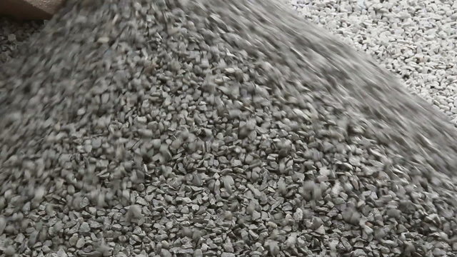 Dumper truck delivering gravel for asphalt plant