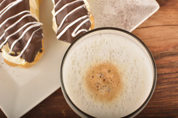 Latte macchiato and eclair