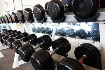 dumbbells for weight lifting in fitness room