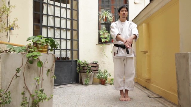 Man doing a performance of karate