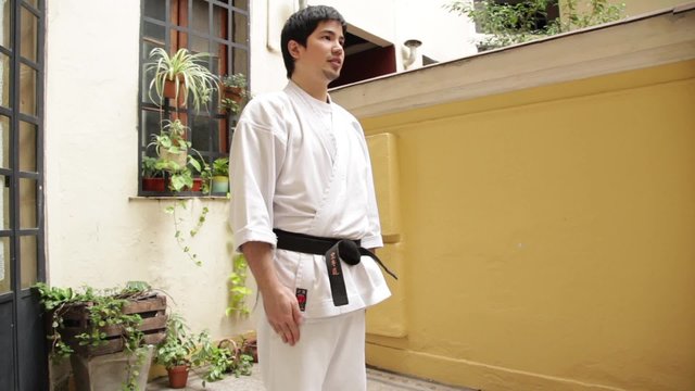 Man doing a performance of karate