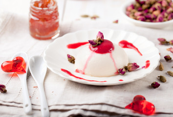 Panna cotta,with berry sauce. Italian dessert. 