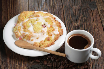 Coffee cup and cake with cherry