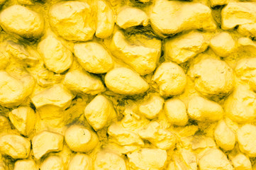 Yellow stone wall